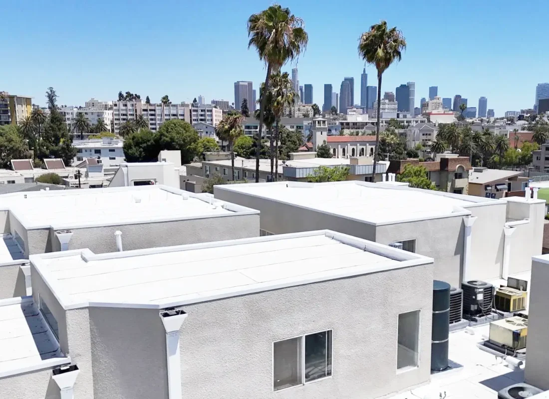 Reliable West Coast Roofing LA team working meticulously on a roof repair in Pasadena